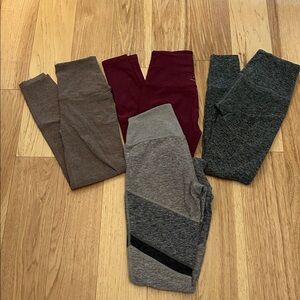 Beyond Yoga, set of four Leggings in Gray, Brown, and Burgundy, and multi.